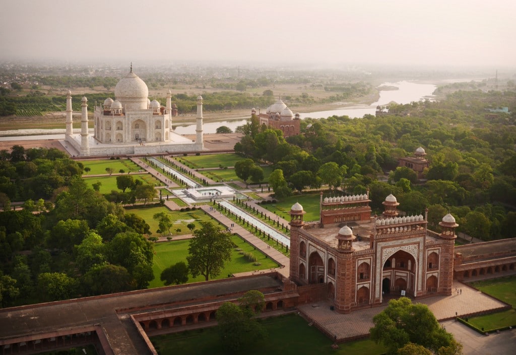 Taj Mahal as the day's first tourists trickle through the gates.