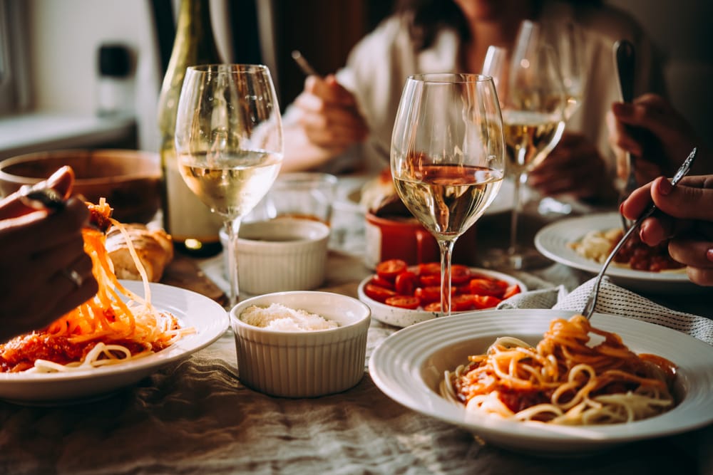 Friends having a Pasta in the best italian restaurant in houston